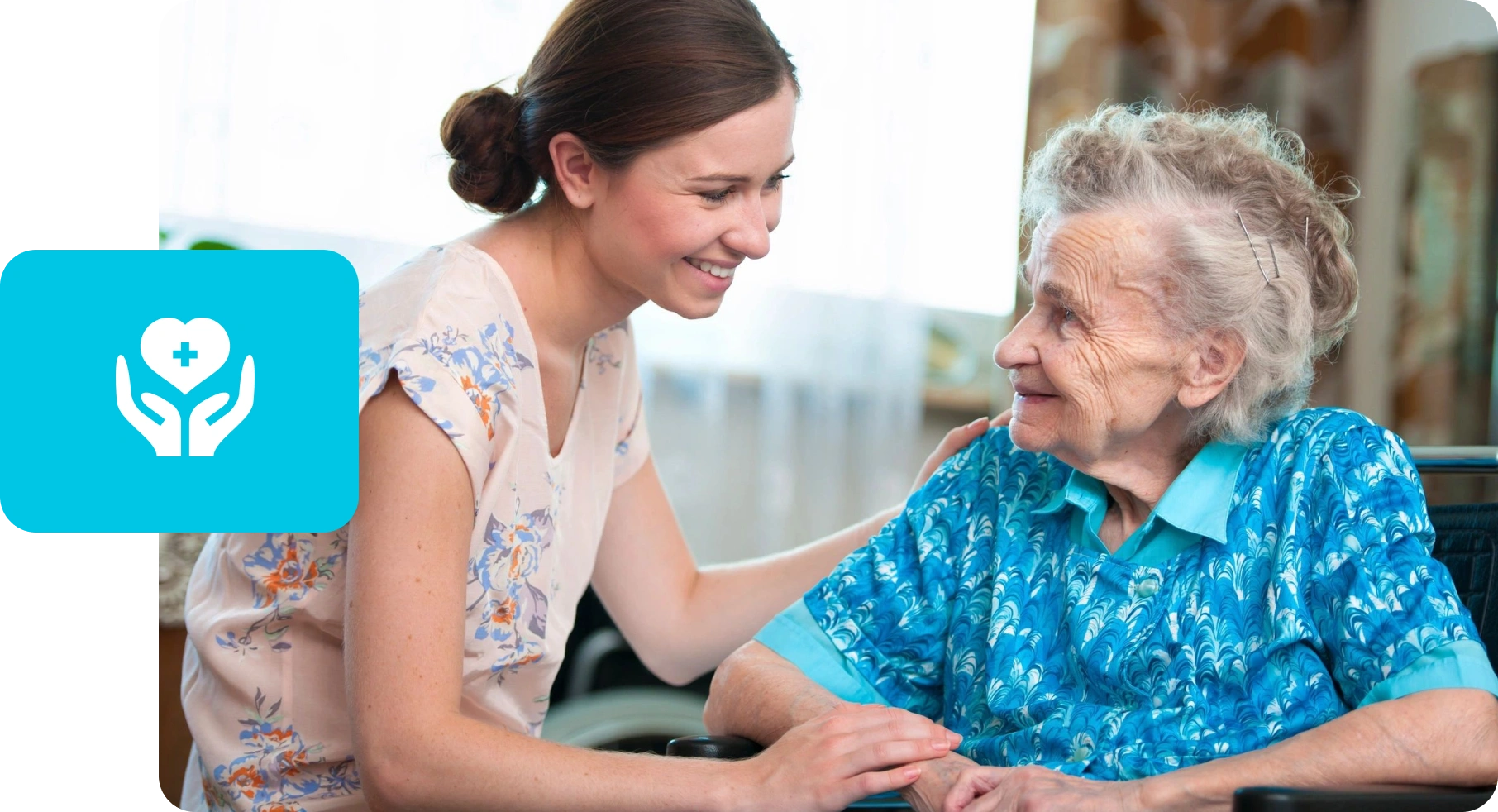 A woman and an old lady smiling for the camera.